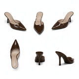 Aliss Shoes Elia brown patent leather pointed toe mule heels with a stiletto heel.
